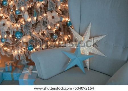 Beautiful room decorated Christmas tree, presents and lights