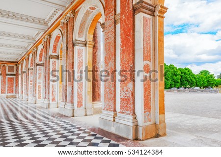 Grand Trianon-little pink marble and porphyry palace with delightful gardens. Chateau de Versailles.France. Royalty-Free Stock Photo #534124384
