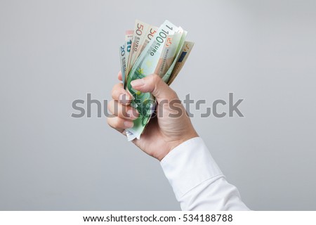 Money in the hand (Hand with money, Hand holding Banknotes), have clipping path.