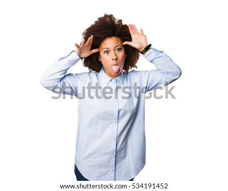 young black woman showing tongue
