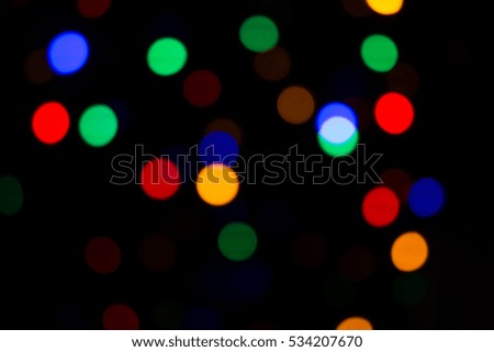 blur lights christmas background on black