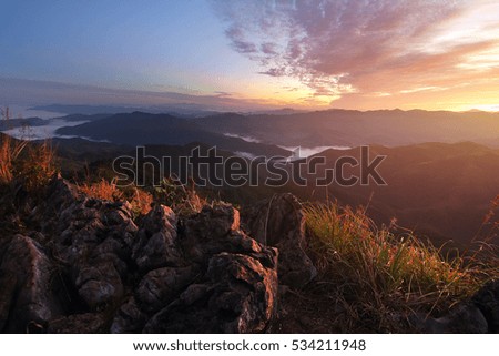 Beautiful scenery during time the sunset view from top of Doi Pha Phung at Nan province in Thailand is a very popular for photographers and tourists. Attractions and natural Concept