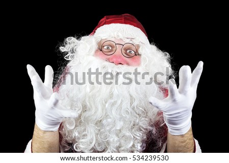 Santa Claus in the Christmas Night Isolated On Black Background