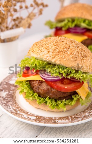 Fresh juicy hamburger. Quick healthy hearty snack.