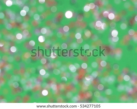 beautiful colorful reflections on green background , closeup