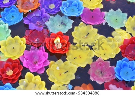 Colorful lotus candles for respecting the Lord Buddha at the temple, Thailand