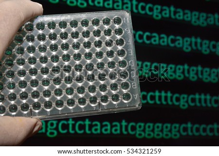 Molecular genetics and biotechnology. In a scientific research laboratory.