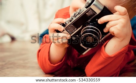 Closeup portrait of a young man taking a picture over white background