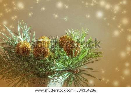 Winter background. Christmas ball  golden background. Christmas decoration. Christmas background. Toned effect