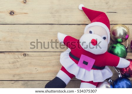 Santa Claus dolls  on wooden background