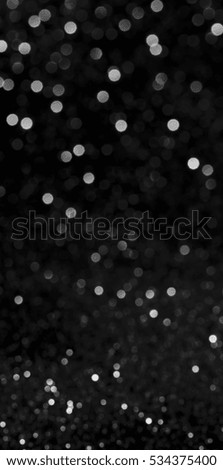 silver and black. defocused. glitter vintage lights Christmas background.