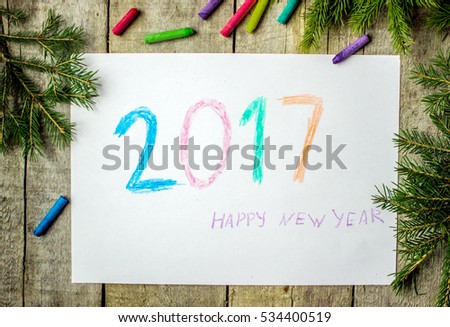 the figure of a child greeting the new year and Christmas.