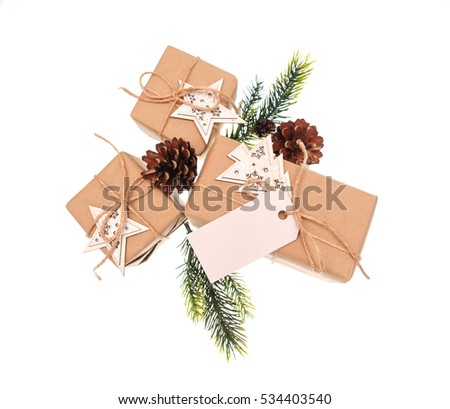 gift boxes tied with a rope wooden stars on white background