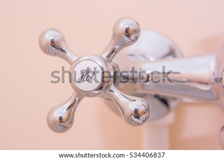 The handle of faucet with Hot sign