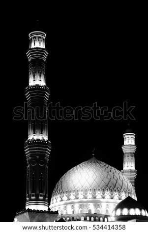Mosque at night and space for text.