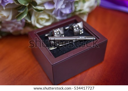 Wedding rings with bouquet and accessories