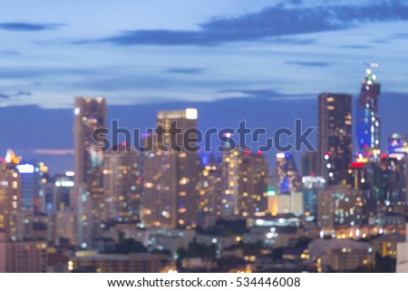 Abstract blurred lights office building with blue twilights sky background