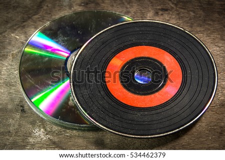 Old CDs On Wood