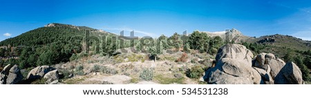 Panoramic View Of Rocky Mountains a blue sky day