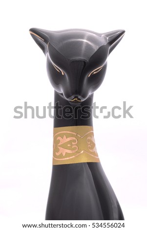black cat figurine isolated on white