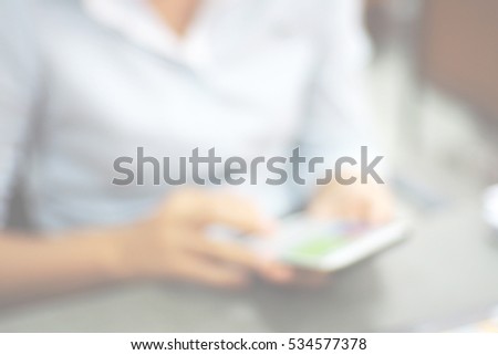 Blurred  background abstract and can be illustration to article of people using technology