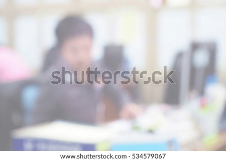 Blurred  background abstract and can be illustration to article of businesspeople typing computer 