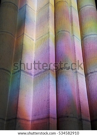 Colorful light from stained glass windows inside the Basilica of Saint Mary of Coro, San Sebastian, Spain