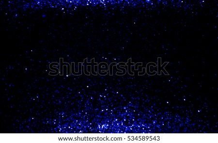 blue and white bokeh lights christmas defocused. abstract background