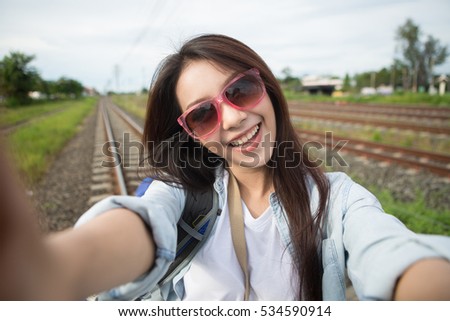 Young beautiful Asia woman photo selfie, asian beauty,travel concept