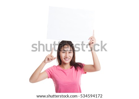 Young Asian woman point to  blank sign  isolated on white background.