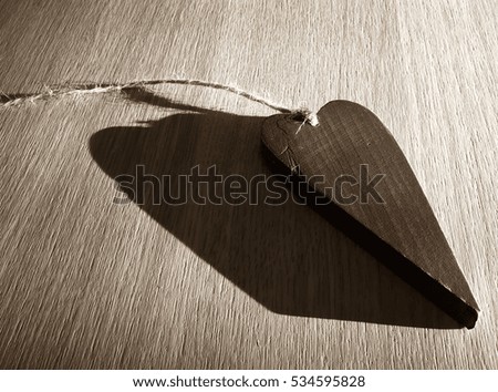 Heart shape on wood background