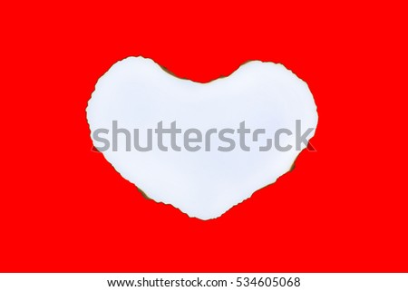 Paper Burning in shape of heart on red background