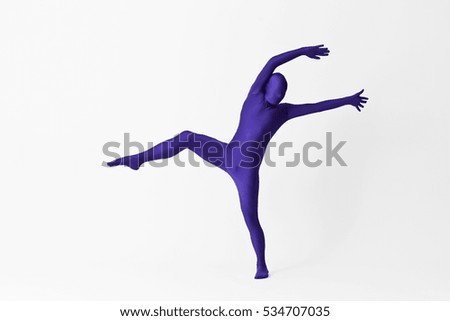Man in bodysuit posing
