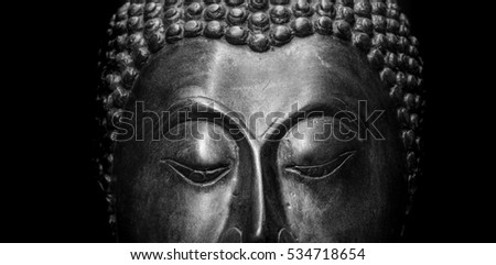 Buddha portrait isolated. Close up buddha statue