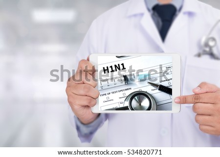 Doctor holding  digital tablet H1N1 , Influenza virus positive Royalty-Free Stock Photo #534820771