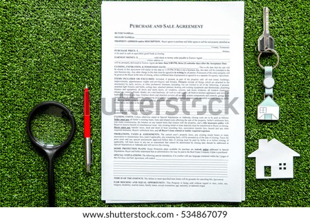 concept of buying house on green background top view