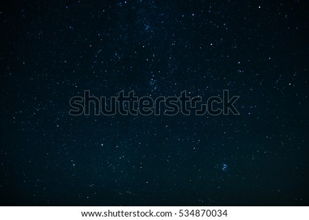 The dark sky with stars and constellations