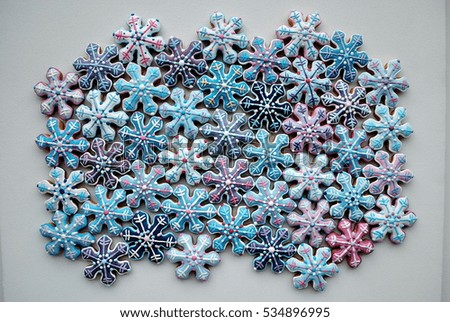 Snowflakes on a white background , Christmas cookies , Star shaped