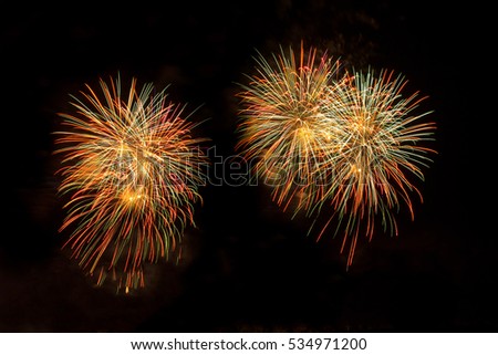 Fireworks light up the sky, New Year and Merry Christmas

