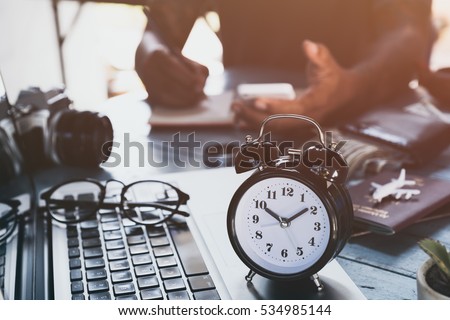 Man with tattoo working at home, save money for family  Royalty-Free Stock Photo #534985144
