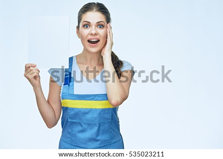 Surprising woman builder portrait with white banner isolated on white background.