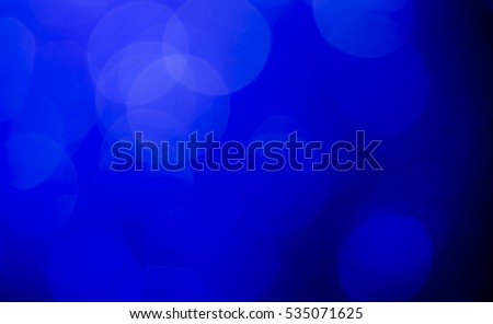blue and white bokeh lights christmas defocused. abstract background