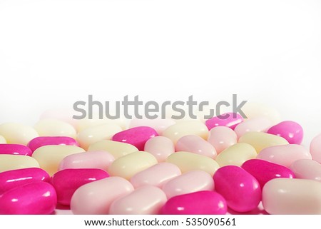 Picture of colorful dragees closeup isolated on white background