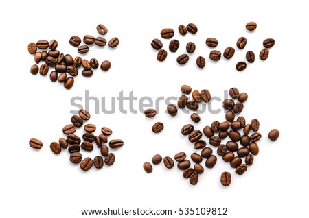 Coffee beans isolated on white background close up Royalty-Free Stock Photo #535109812