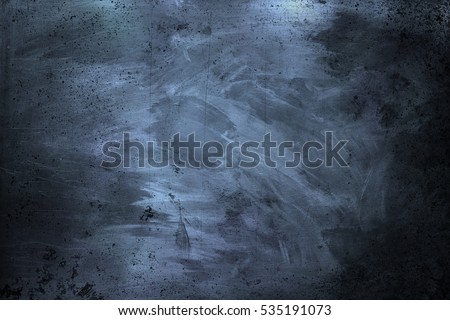 Abstract old Dirty Scratched Dark Metal Texture with toning in Navy Blue Color. Grunge Background with Copy Space.