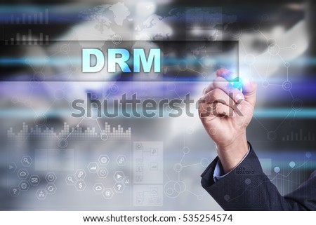 Businessman is drawing on virtual screen. drm concept.