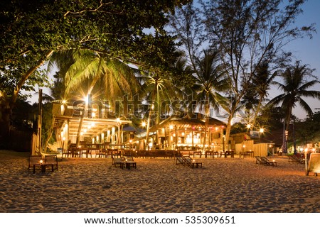 Evening Phangan beach glowing lights or bars and restaurants Royalty-Free Stock Photo #535309651