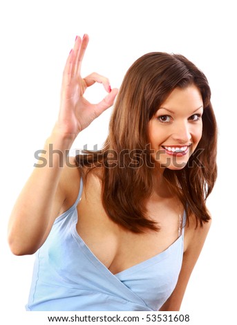 Beautiful young woman indicating ok sign, isolated on white.