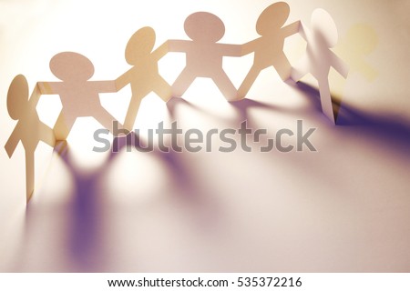 Team of paper doll people Royalty-Free Stock Photo #535372216