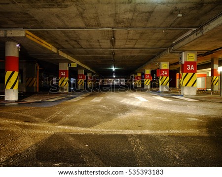 Empty Overground Parking Lot at Shopping Center during Night Time in Vilnius, Lithuania